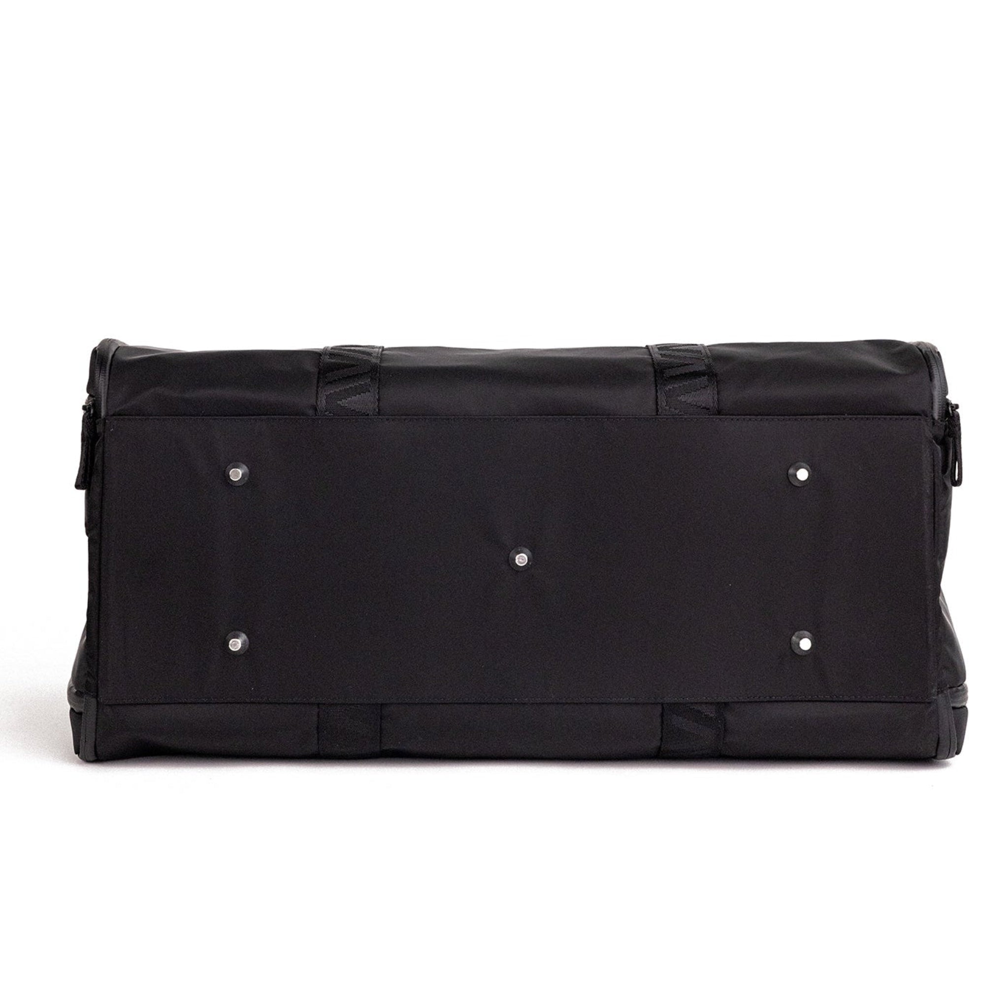 Bottom view of Veltri Sport Ellis Garment Duffle showing protective metal feet for durability during travel